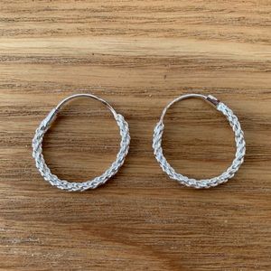 Fine, pure Silver Hooped earrings with texture / braiding